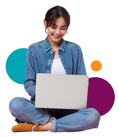 Woman sitting on the floor with a laptop